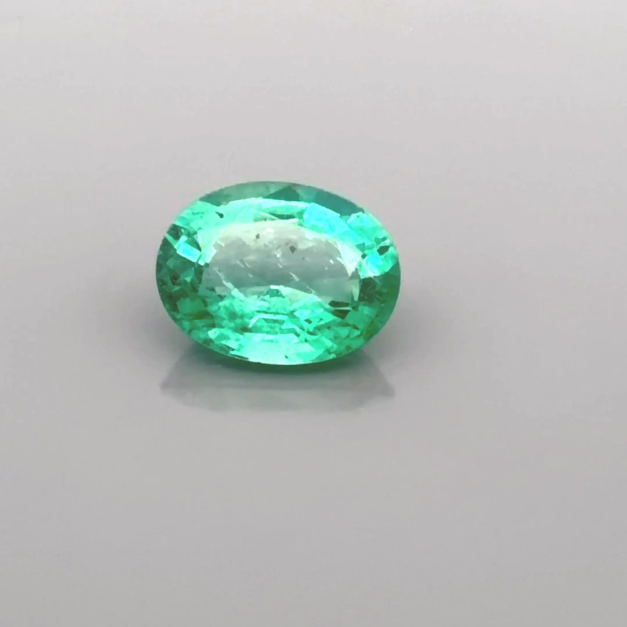 1.96ct Oval Natural Emerald (Colour Green, Clarity Slightly Included, Cut Faceted)